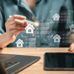 Close-up of individual using stylus to interact with virtual housing checklists on screen symbolizing real estate choice and digital property search